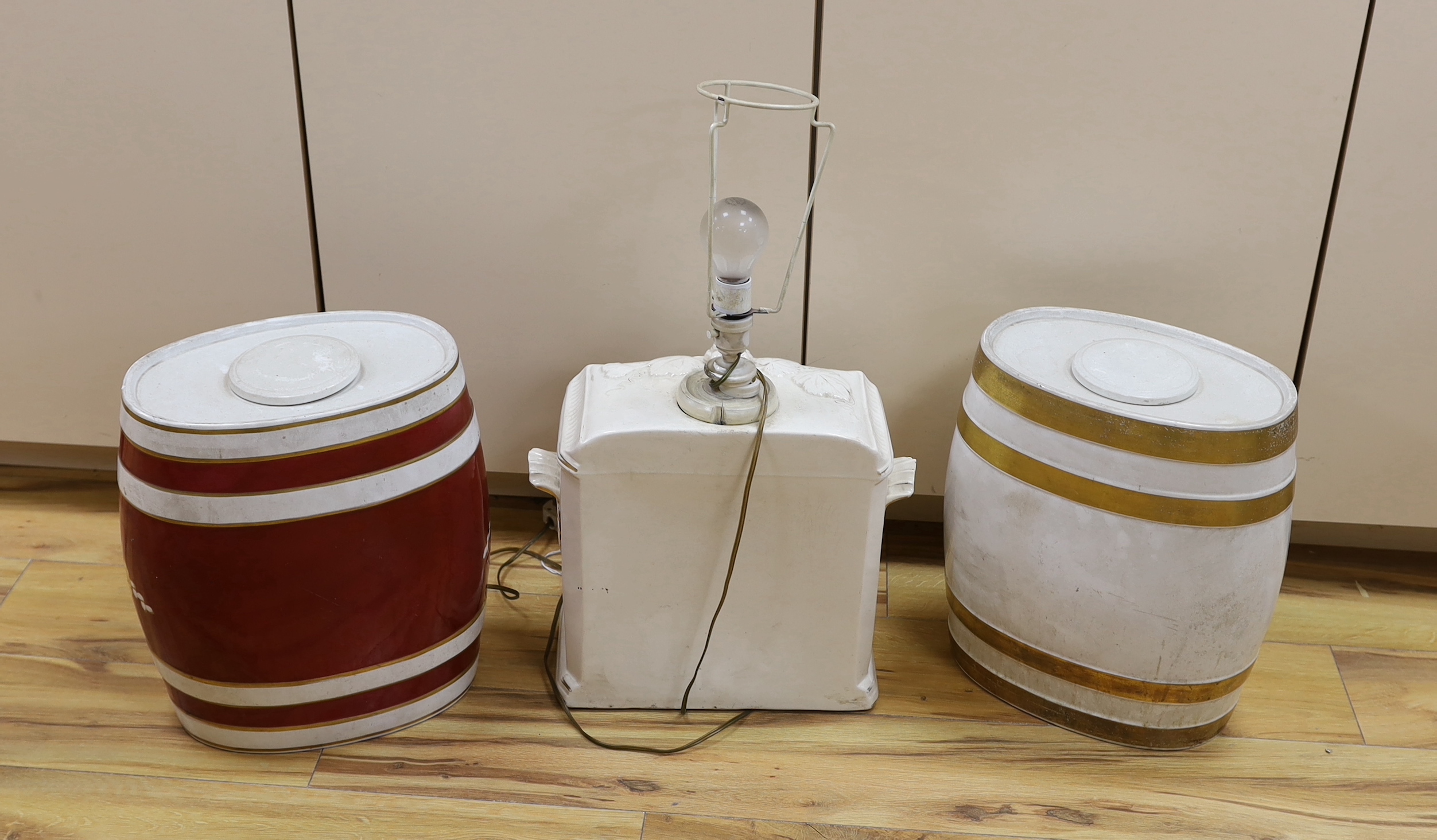 Two pottery sherry barrels (one mounted as a lamp) and flasks and a whisky barrel